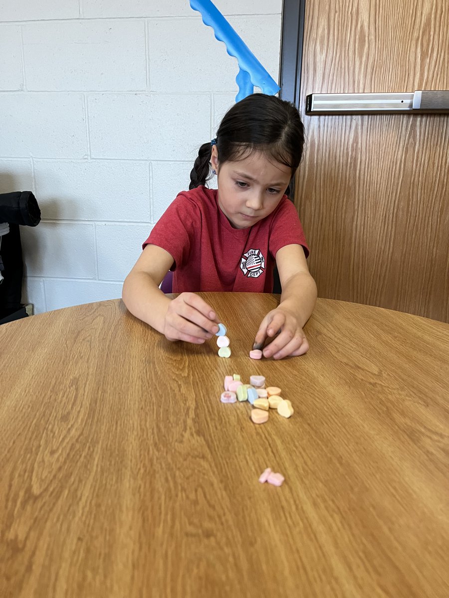 Kindergarteners played Valentine "Minute to Win it" games yesterday.