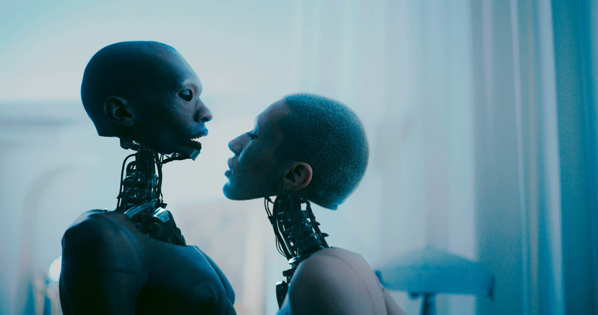 A futuristic robot DJ booth with a robot figure