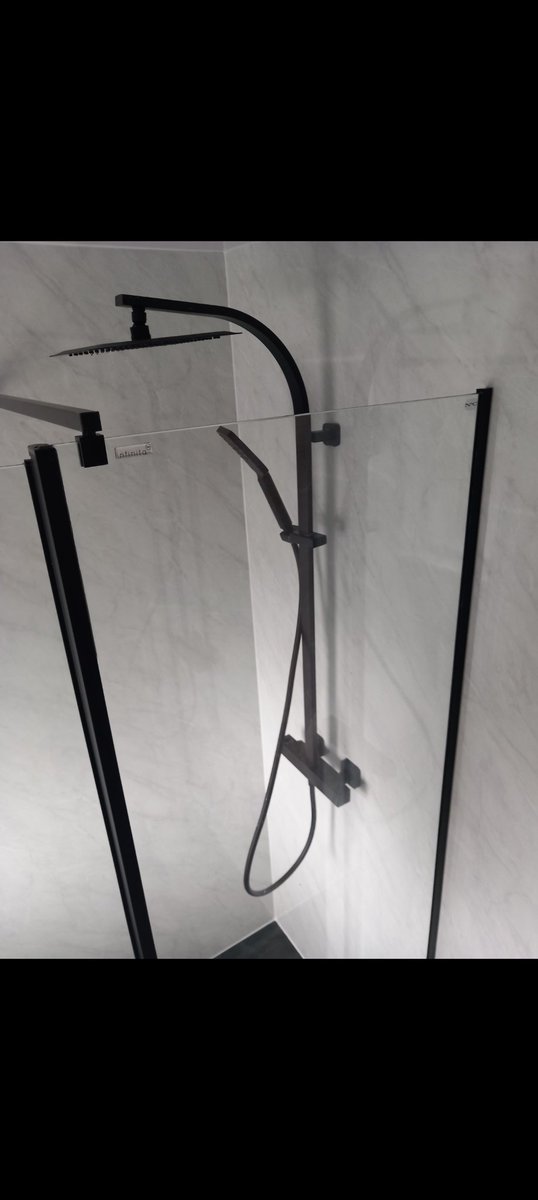 Bathroom renovation in swansea. Aquamural panels from Bassetts swansea. Sanitaryware from <a href="/NCTilesAndBath/">N&C Tiles and Bathrooms</a>