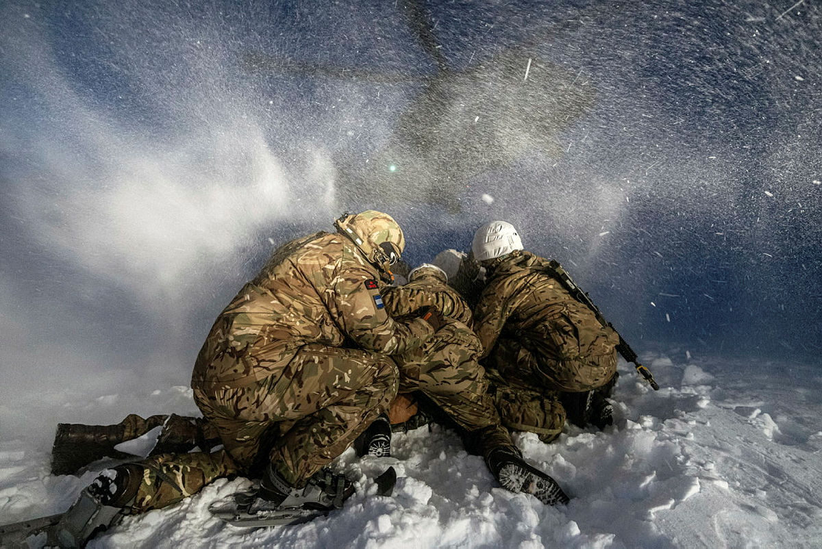 BFBSRadioHQ's tweet photo. A tight huddle is necessary when a Merlin is coming into land! 🚁❄️

📸 POPhot Kyle Heller https://t.co/yutS2d8oUK