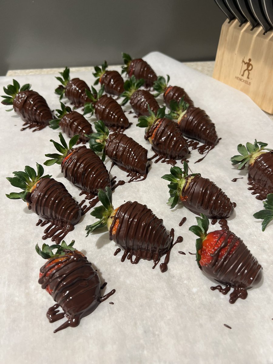 My husband and I don’t usually do much for Valentine’s Day. Yesterday, I came home from work at 8 pm to find he had handmade a batch of dark chocolate strawberries. 

I love this man. The best part is he doesn’t like chocolate covered strawberries so I don’t have to share!