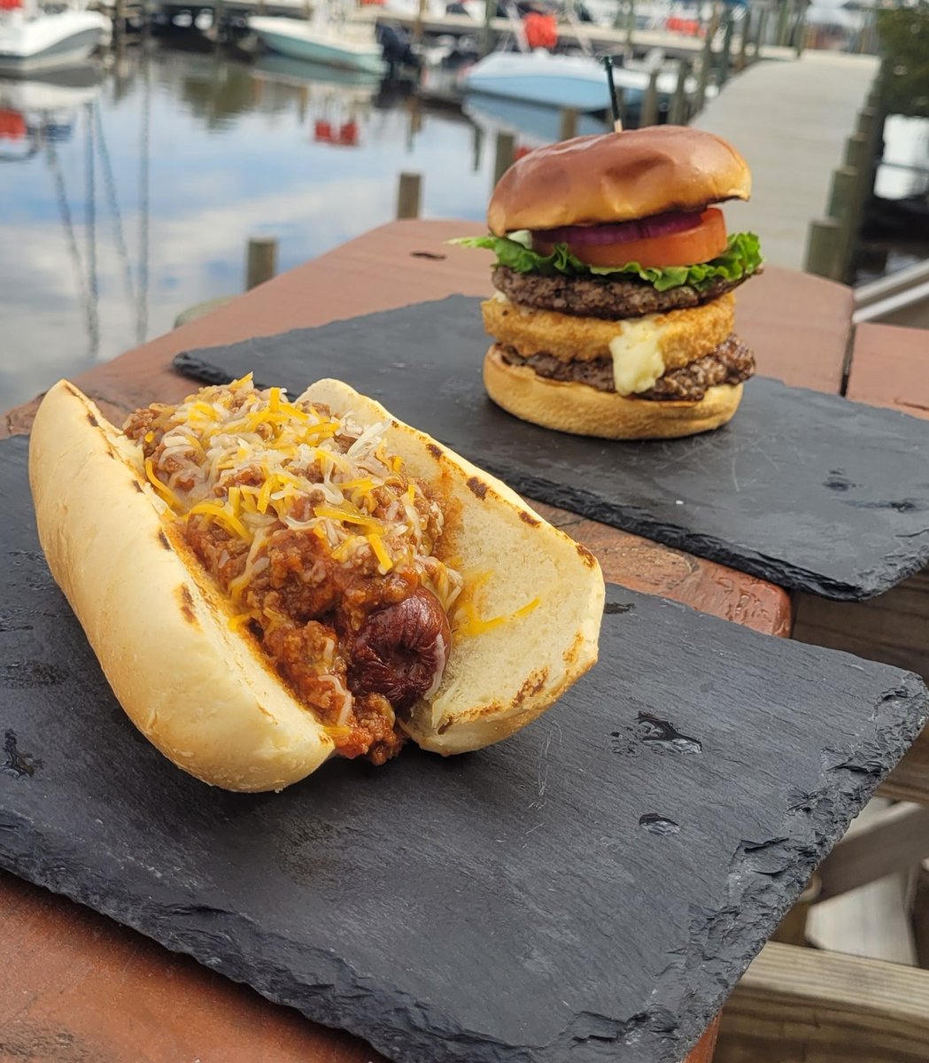 Today at LJ Schooners Dockside Restaurant & Oyster Bar...
Bacon Wrapped Smoked Sausage with Chili & Cheese and one side $13

Fried Brie Cheese Smash Burger with Veggies and one side $17

#lunchonthebay #waterfrontdining