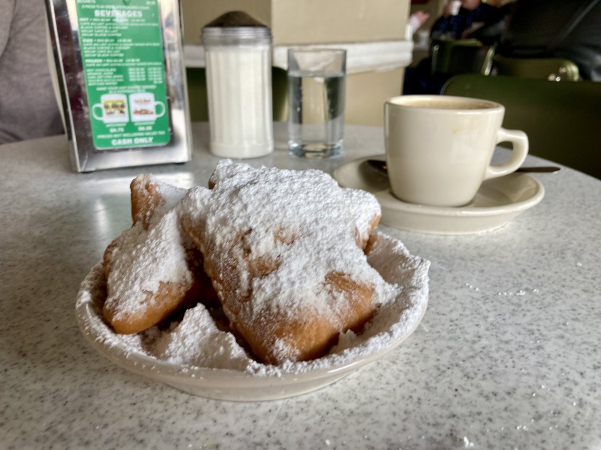 Getting ready for the #ISRP2024 psychedelic meeting with a cafe au lait ☕️ and beignets 🍩 at Cafe Du Monde