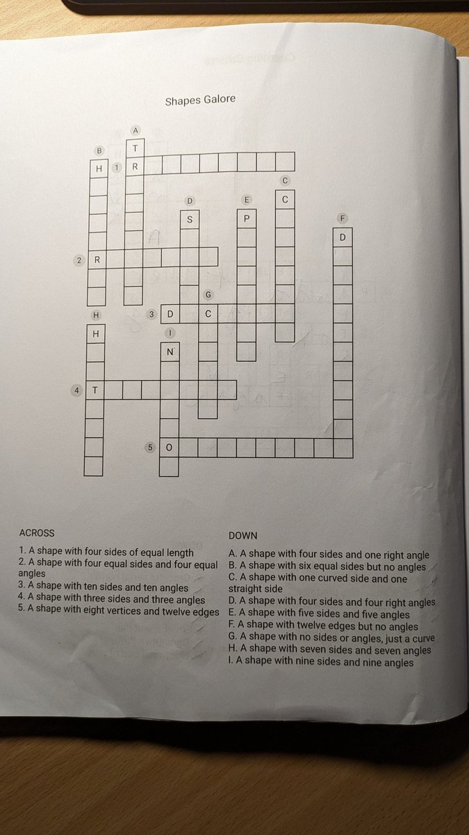 Some hugely dodgy clues and even dodgier apparent answers in this crossword book for 6-8 year olds... Beware bad maths.
