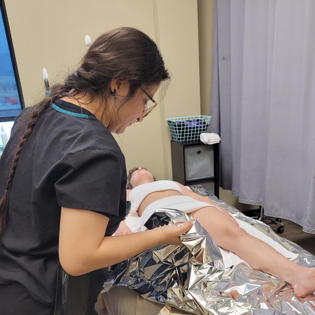 Massage Therapy student Kassandra practicing Mylar and Heated wraps on student Marguerite during the SPA Techniques Module.

#MilanInstitute #MIClovis #Clovis #MassageTherapy #MassageTherapists #MylarWarps #HeatedWraps #SpaTechniques