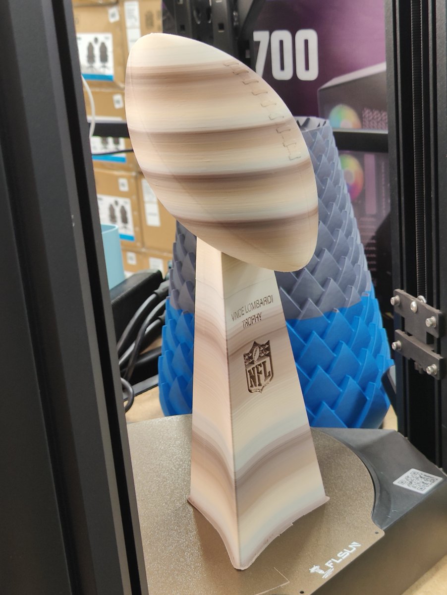 Our 3D Associate from the Overland Park, KS Micro Center printed a Vince Lombardi Trophy Printed with Inland Matte Clay Rainbow Filament STL Designed by jefftml and available from @printables #inlandfilament #Superbowl #NFL #kansascity #kansascitychiefs #chiefs