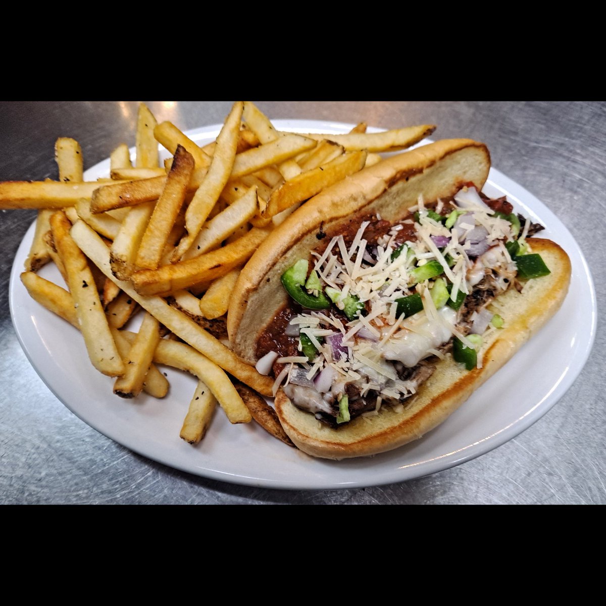 New Weekly Food Special - Smoked Pork Pizza Hoagie! Our house-smoked pork with scratch-made marinara, served on a toasted roll, with mozzarella, jalapeno, red onion and parmesan cheese. Served with a side item of your choice. #BrewedOnBase