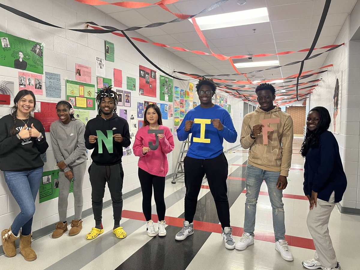 MmeShepard's tweet image. Some of our BHM/NJIF hallway helpers. I’m so lucky to work someplace where I spend so much of my day smiling 🖤💚❤️ #aagv