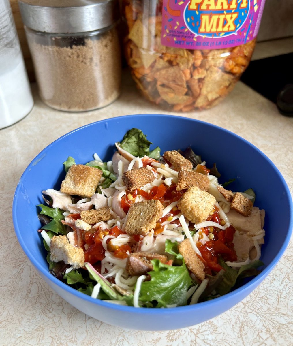 Modified hoagie salad.  Turkey, pepperoni, muhtz, shaved red onion, Italian vinaigrette, hot pepper relish and croutons on a bed of assorted greens.  Good living right here!