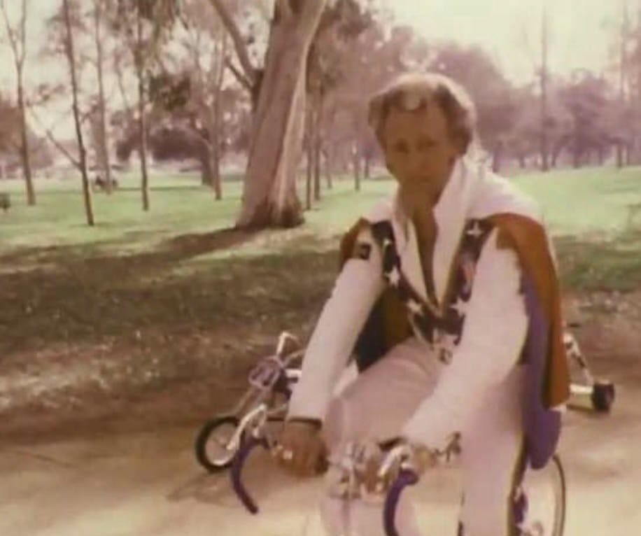 Super70sSports's tweet photo. “Hey, kids, it’s your old pal Evel Knievel here. You probably don’t have a motorcycle but I bet you do have a bike. And there’s some pretty badass things in the world you can try to jump over too. Don’t tell your mother I told you this because that’s what a pussy would do.” https://t.co/0h27Om0Kug
