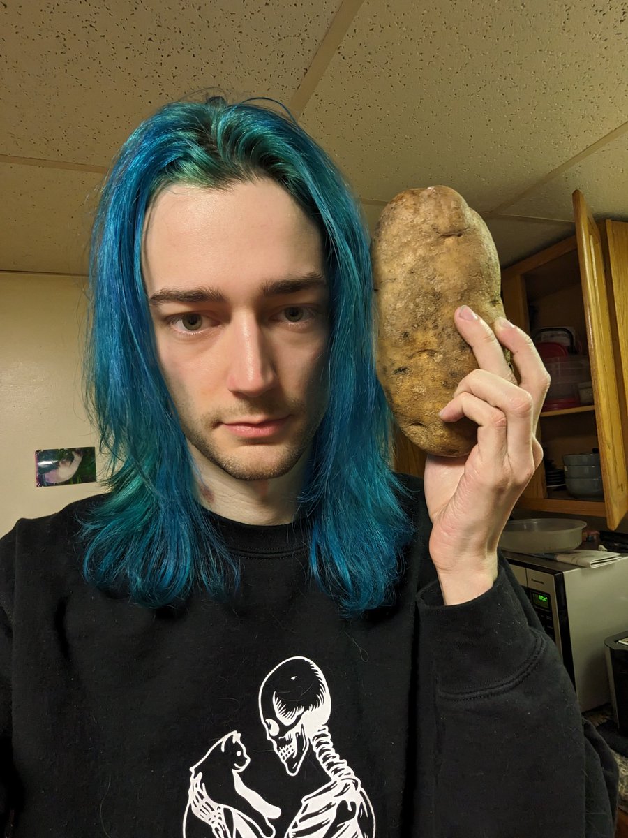 BluTar_'s tweet photo. I posted a picture of myself with this rather large potato in a discord server with some friends and this thread is the resulting images in chronological order. https://t.co/QoooyzbvdB