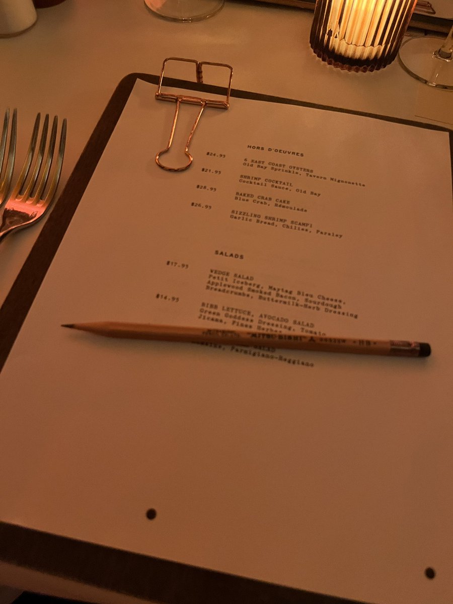 Fancy pencils instead of florals at a fancy restaurant? The writer in me loves it.
