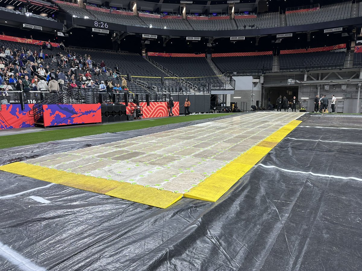 NPappas23's tweet photo. Some #SBLVIII BTS - @Usher halftime rehearsals.

EnkaMat, rain tarps (painted w/ field markings) &amp; concert decking used to protect grass from ~40 stage &amp; production carts &amp; 1,000+ people involved.

Happened 3 days in a row for 2hr each day.

A unique challenge! #FromTheField https://t.co/z7P4vyyfZI