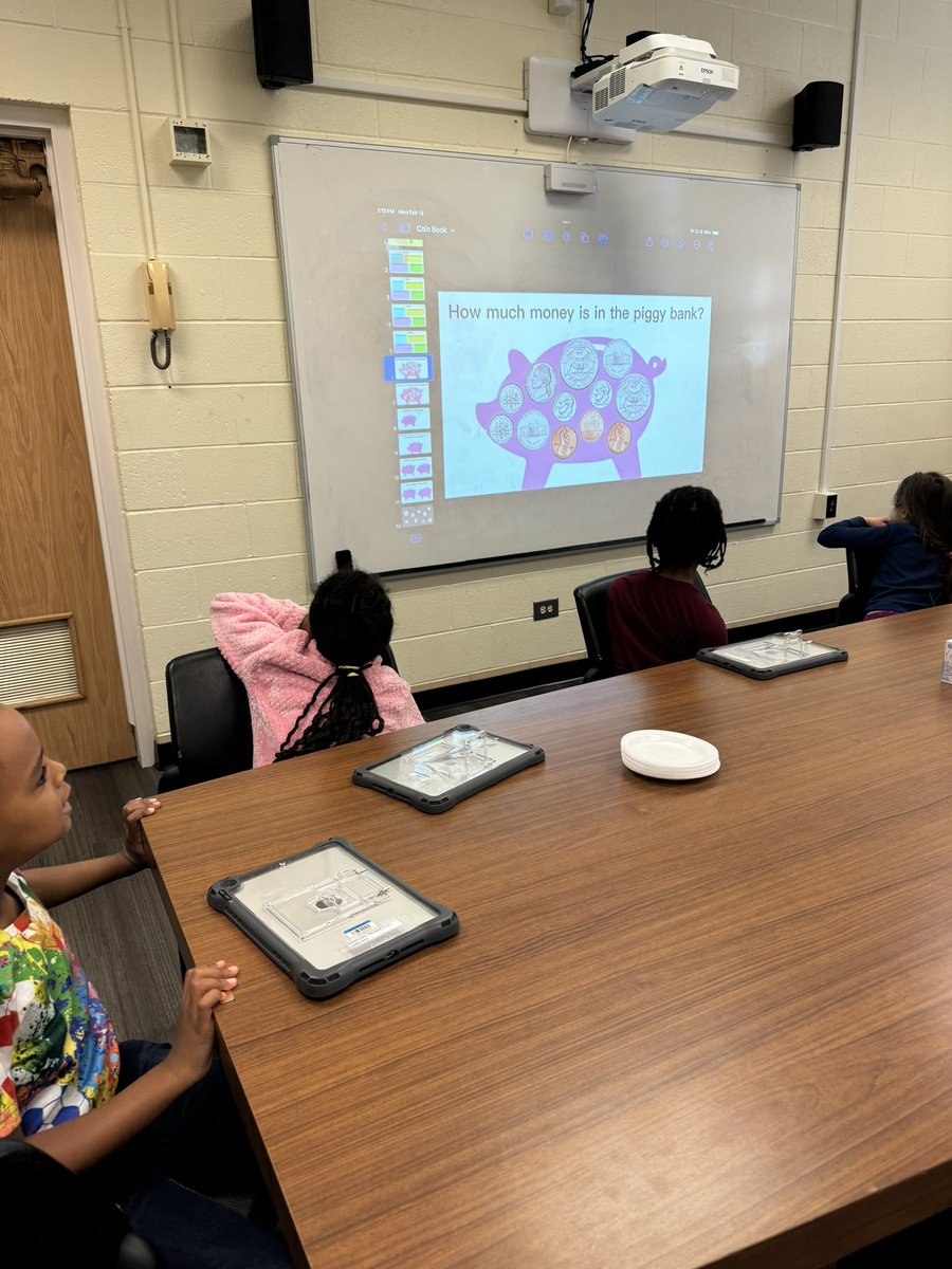 katgracea's tweet photo. Teaching 1st graders at @TerraceTigers how to create a coin book in Keynote! Students learned how to animate the coins to show different money amounts! #DLDay #RISDAIM @RISDiTeam https://t.co/Nc2Vc9sgKN