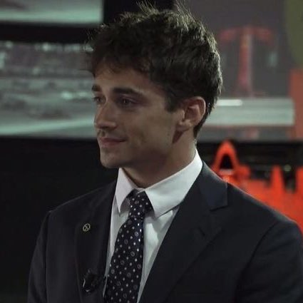 charles in a ferrari suit >>>