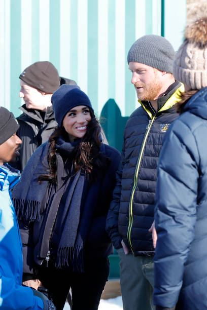 AModernDuchess's tweet photo. The way she looks at him with all that love is so sweet. She's literally gushing. 🥰

#PrinceHarryandMeghan 
#PrincessMeghan 
#WinterPrincess 
#HarryandMeghaninVancouver https://t.co/K2CBVfWy15