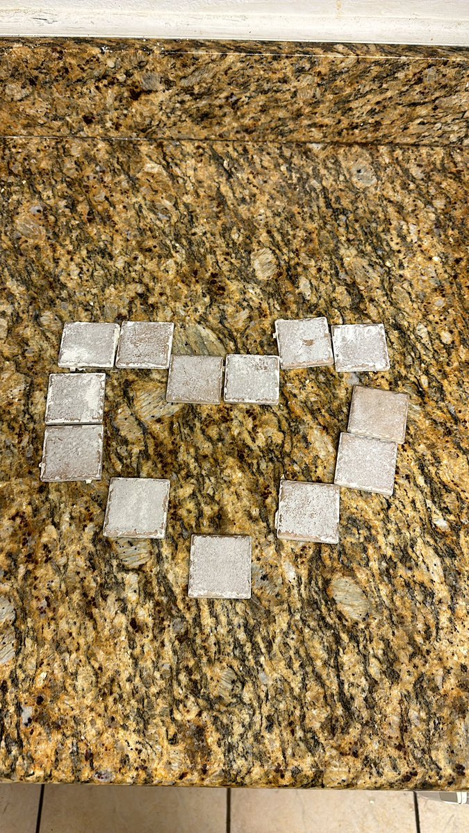 made a heart out of the psych wards loose shower tiles :)