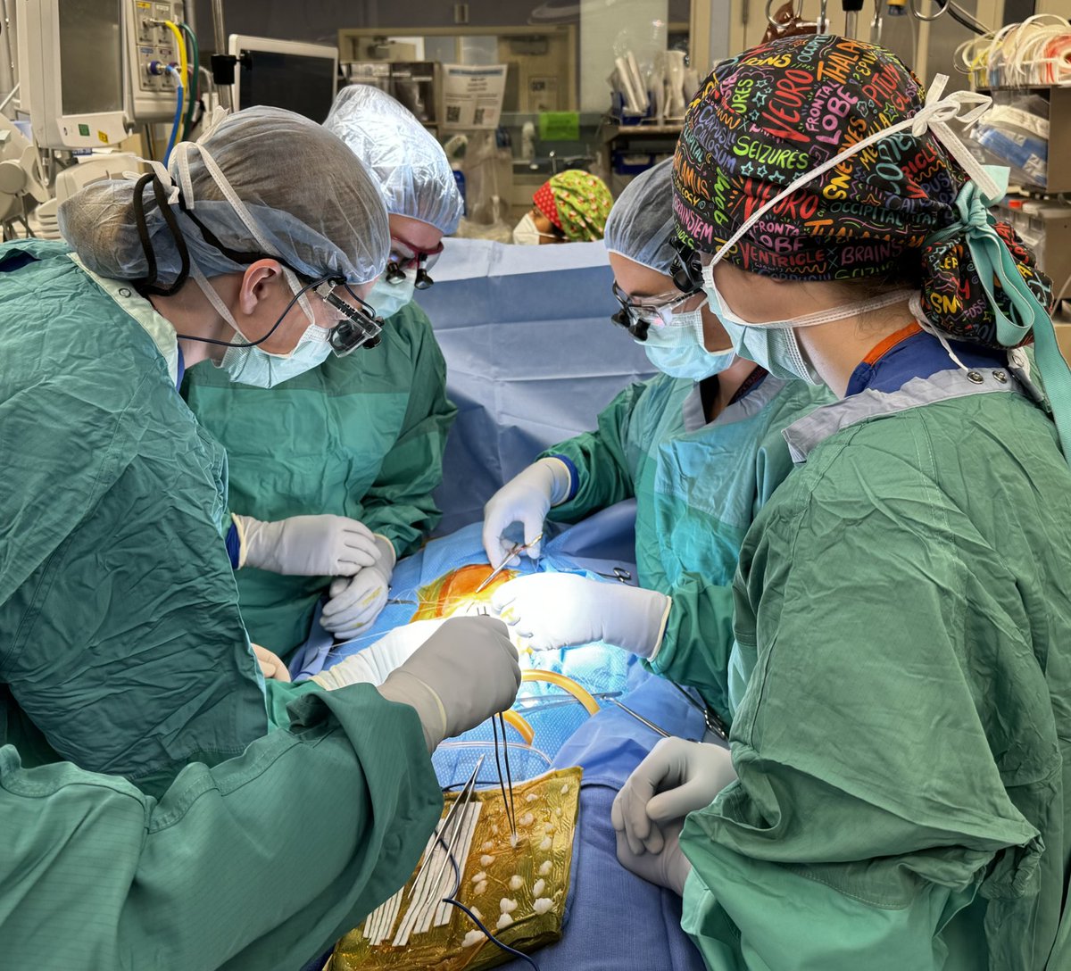 Nicole Wenger, PGY-4 and Maureen Rakovec, PGY-1, performing a myelomeningocele repair with Dr. Parker @WParkerMDPHD  and Dr. Groves.