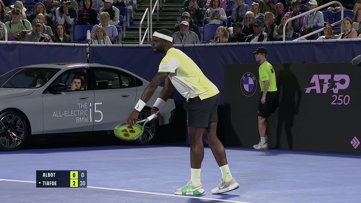 BastienFachan's tweet photo. I can’t think of a more American (derogatory), dystopian tennis experience than watching a match from the confines of a BMW car parked in one corner of the court lol https://t.co/s8xJbb4tzk