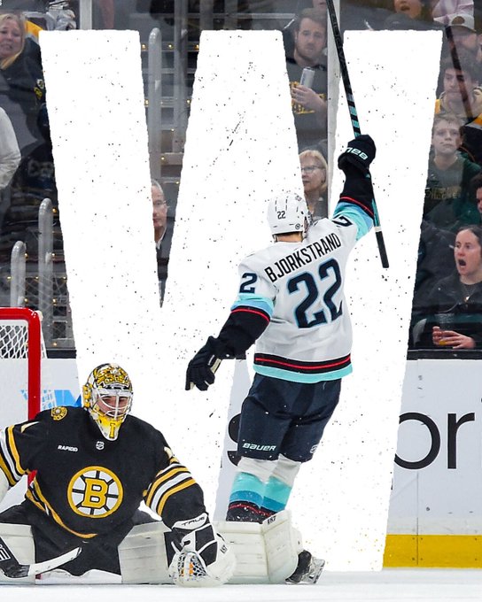 Bjorkstrand celebrating Tolvanen’s goal with a giant W photoshopped behind him