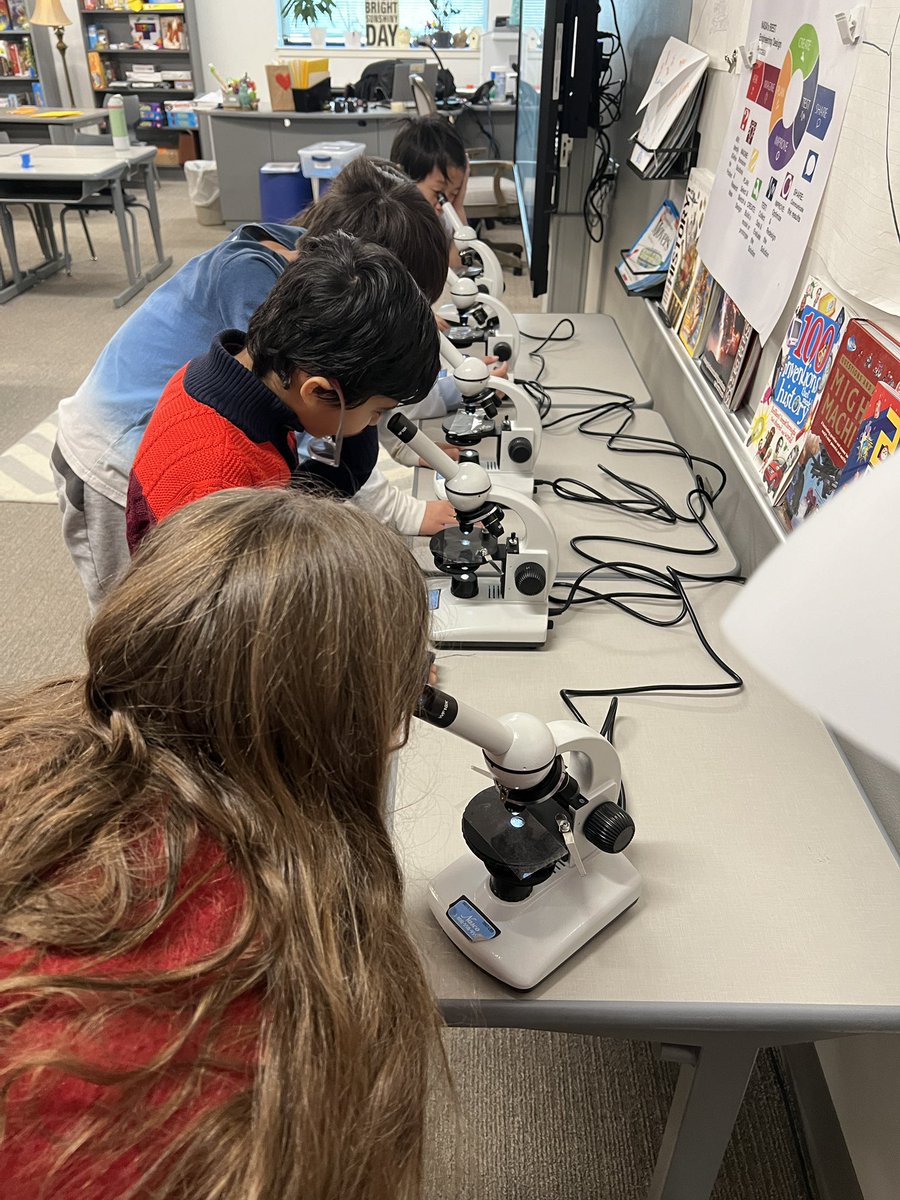 These forensic scientists are looking at fibers found at a crime scene. We are one step closer to solving the mystery! #ReevesAchieves