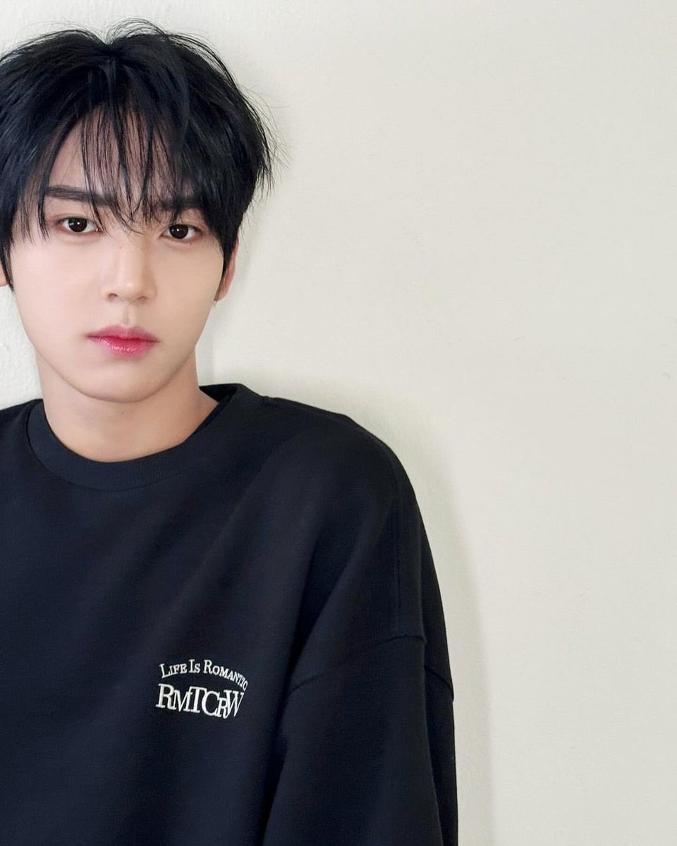 Captured in the timeless simplicity of a plain black shirt, I find solace in the elegance of understatement. In a world filled with noise and distraction, sometimes it's the quiet moments, the ones stripped of embellishment, that resonate the most.