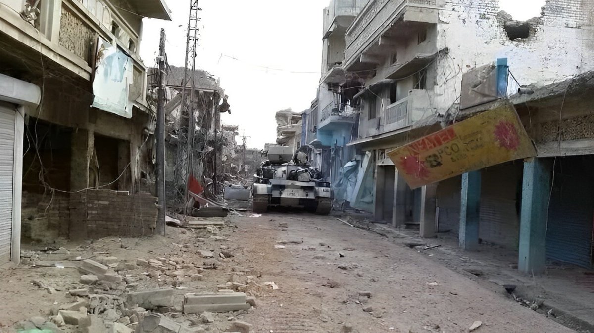 Pakistan Army War on Terror.
Frontier corps (LEA) Type 69 entering decimated Street somewhere in Miranshah.