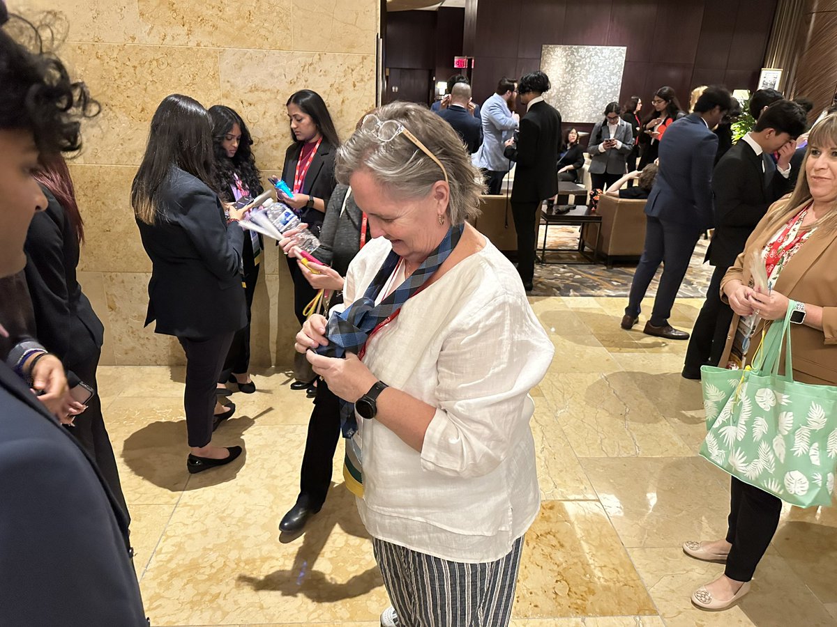 trthompson68's tweet photo. Those small things teacher do. That can make such a difference Centennial HS Mrs. Jones helping out before #texasdeca state opening session in Houston. #titannation #cen10titans #cen10deca #friscoisd #texasdeca #deca https://t.co/TTqwKdczNI