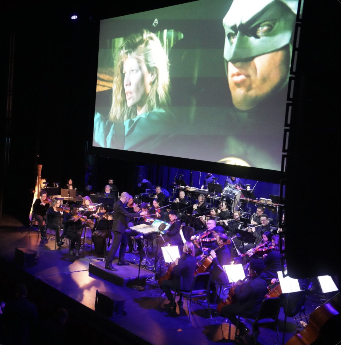 DCinConcert's tweet photo. Celebrate the 35th anniversary of #Batman '89 with #BatmaninConcert, where the film score will be played live, bringing a whole new dimension to the movie! To find out when the #CapedCrusader will be stopping by your city, go to https://t.co/o7jornX3aa.  🦇✨
#DC #filmsinconcert https://t.co/f4XuzZLJg3