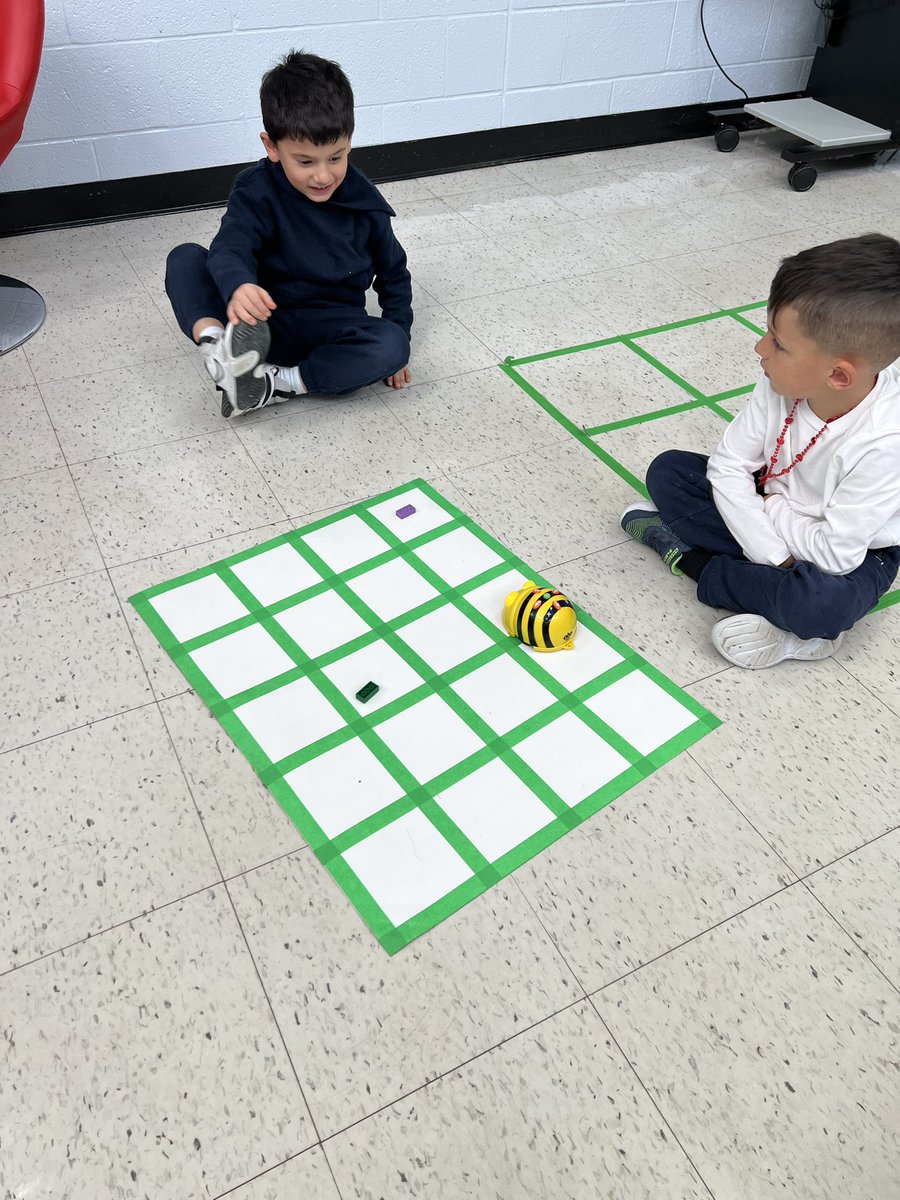 Kindergarten students have fun learning about coding using Bee-Bots in the Library Learning Commons! @ElizabethCrowe_