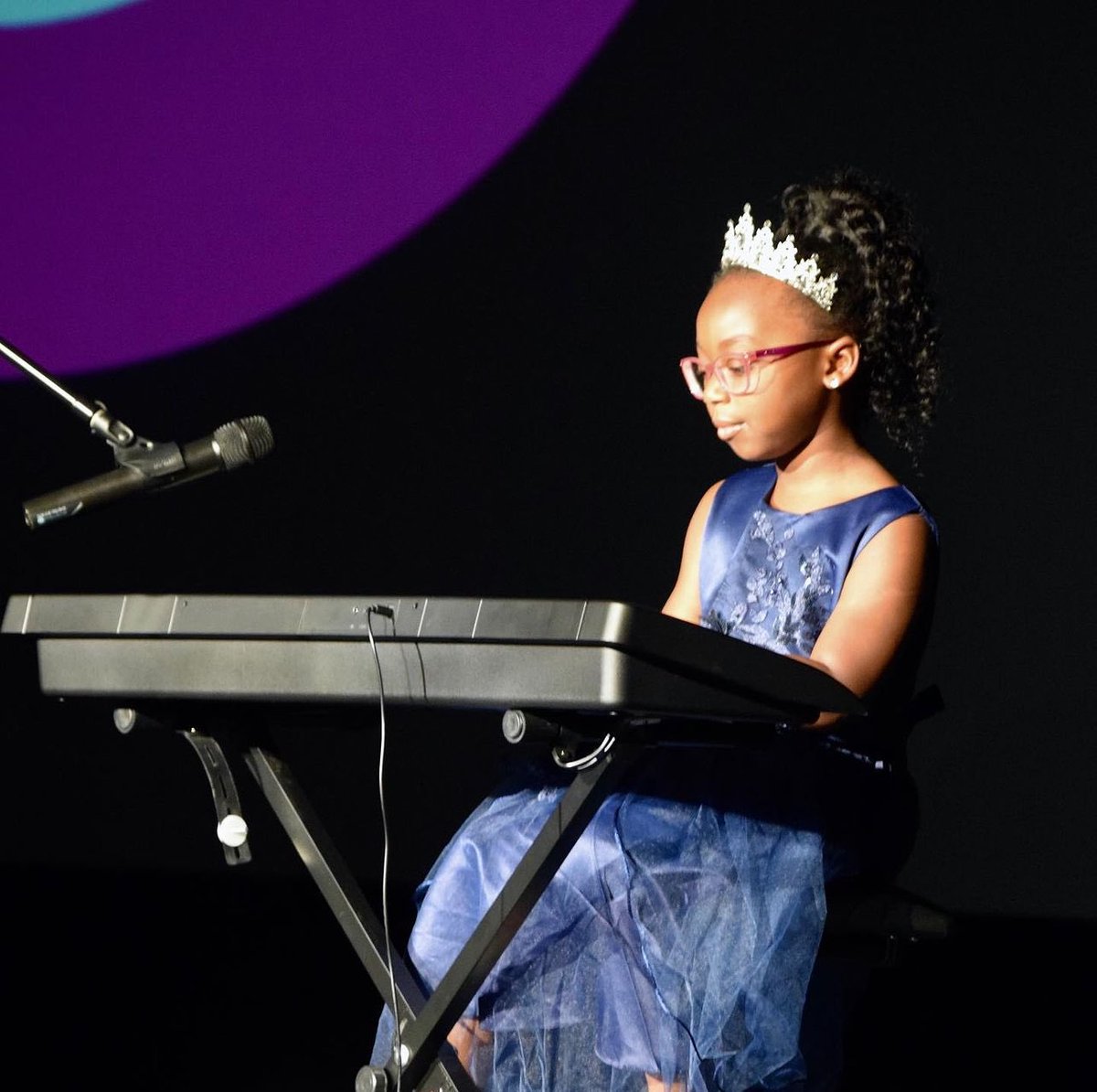 Our Queens are merely oozing with talent! NATIONAL QUEEN Laila-Joy Perry, Little Miss Black US of A, Princess, enjoys sharing a beautiful piano solo. - Photo Credit: @kellikellyphotography