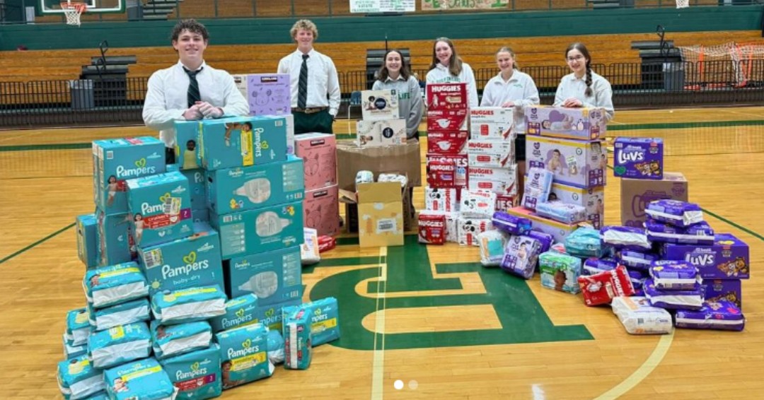 Bishop_England's tweet photo. 🍼  The Bishops for Life Club members collected over 9,300 diapers donated by students and staff! 
💚 Thank you to everyone who supported young mothers in need at Bundles of Joy Diaper Bank, St. Clare's Home, and SOUL (Sanctuary of Unborn Life). #OurBEcommunity #BishopsforLife https://t.co/MtWoouSDxx