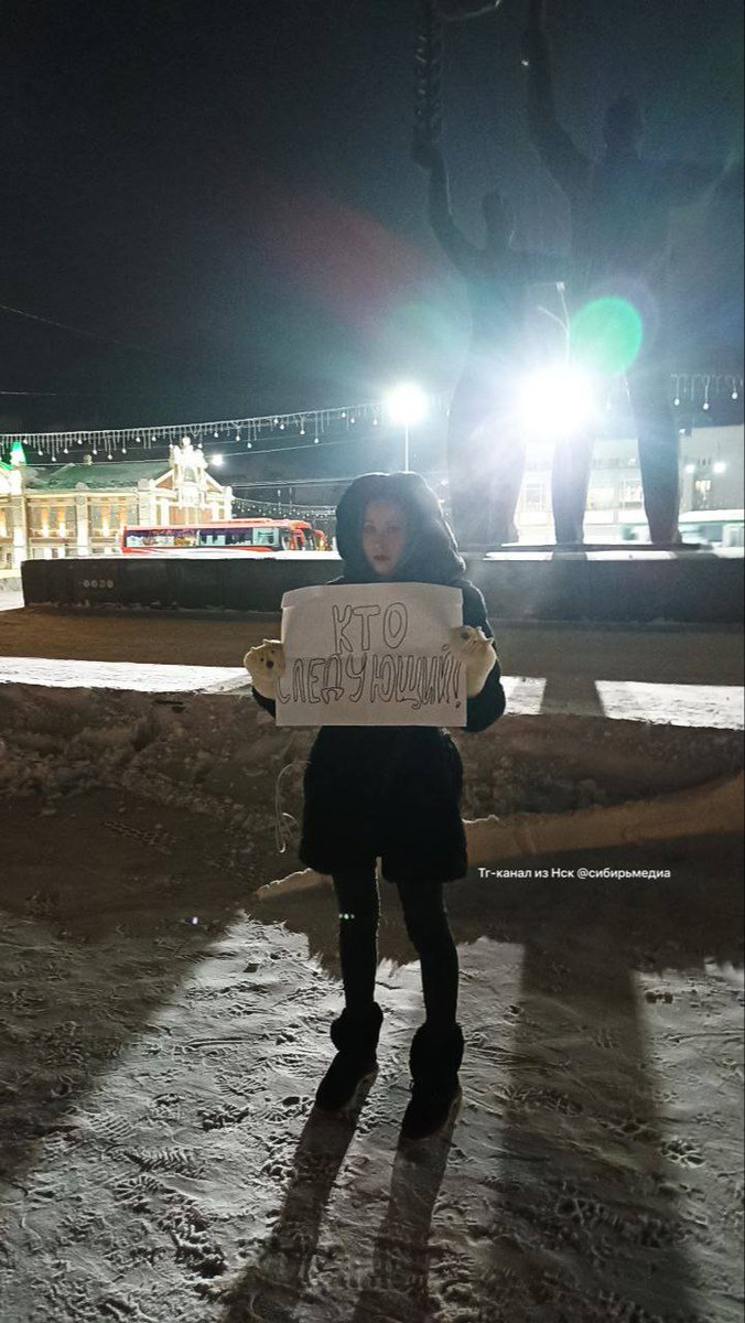 “Who’s next?” says the banner that a young woman is holding at a solo protest in the Russian city of Novosibirsk following the news of Alexey Navalny’s death. 

📷: Sibirmedia
