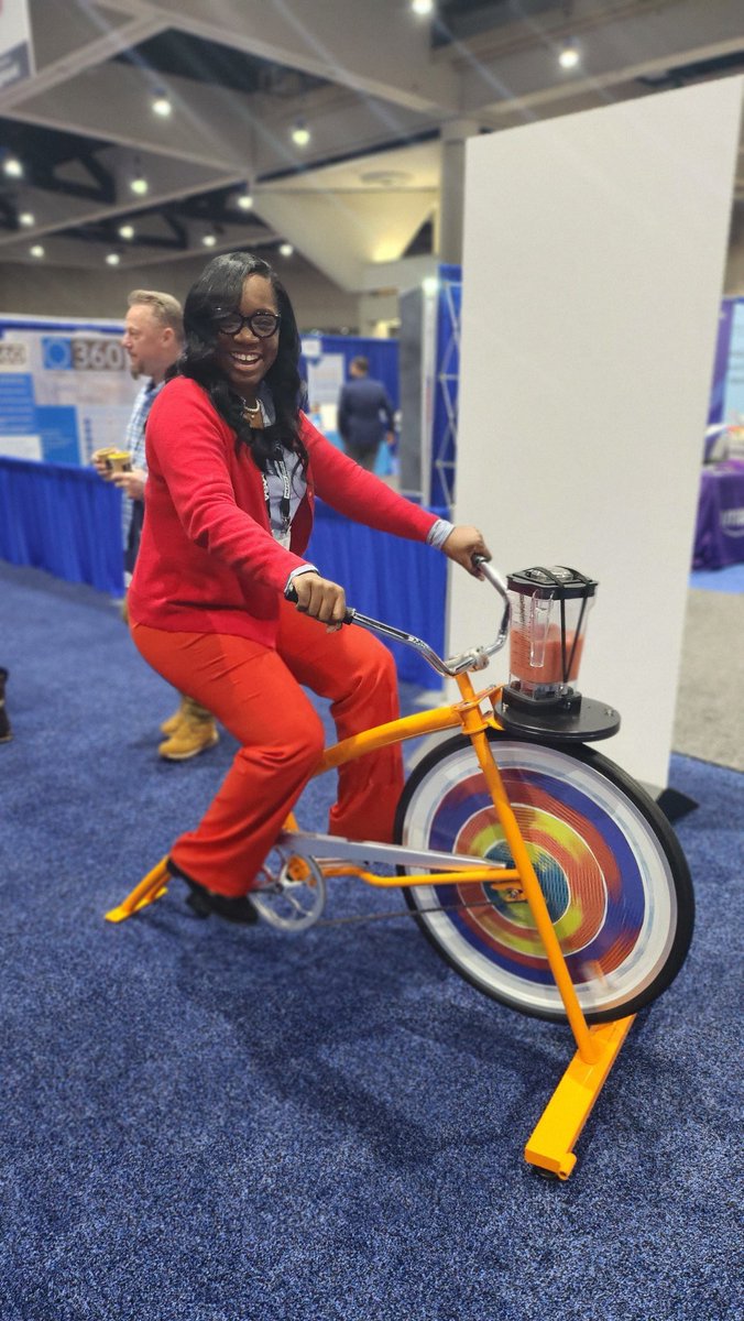 PrincipalDrH's tweet photo. Talk about #STEM !! How do you get your cardio in and make a smoothie simultaneously? With a #blenderbike ! This is the greatest creation ever! P.S....I took it back to my childhood and started to pedal, standing up! Our scholars would love this!!! #NCE2024 #Exhibithall #AASAWELL https://t.co/XmVIhpsC87
