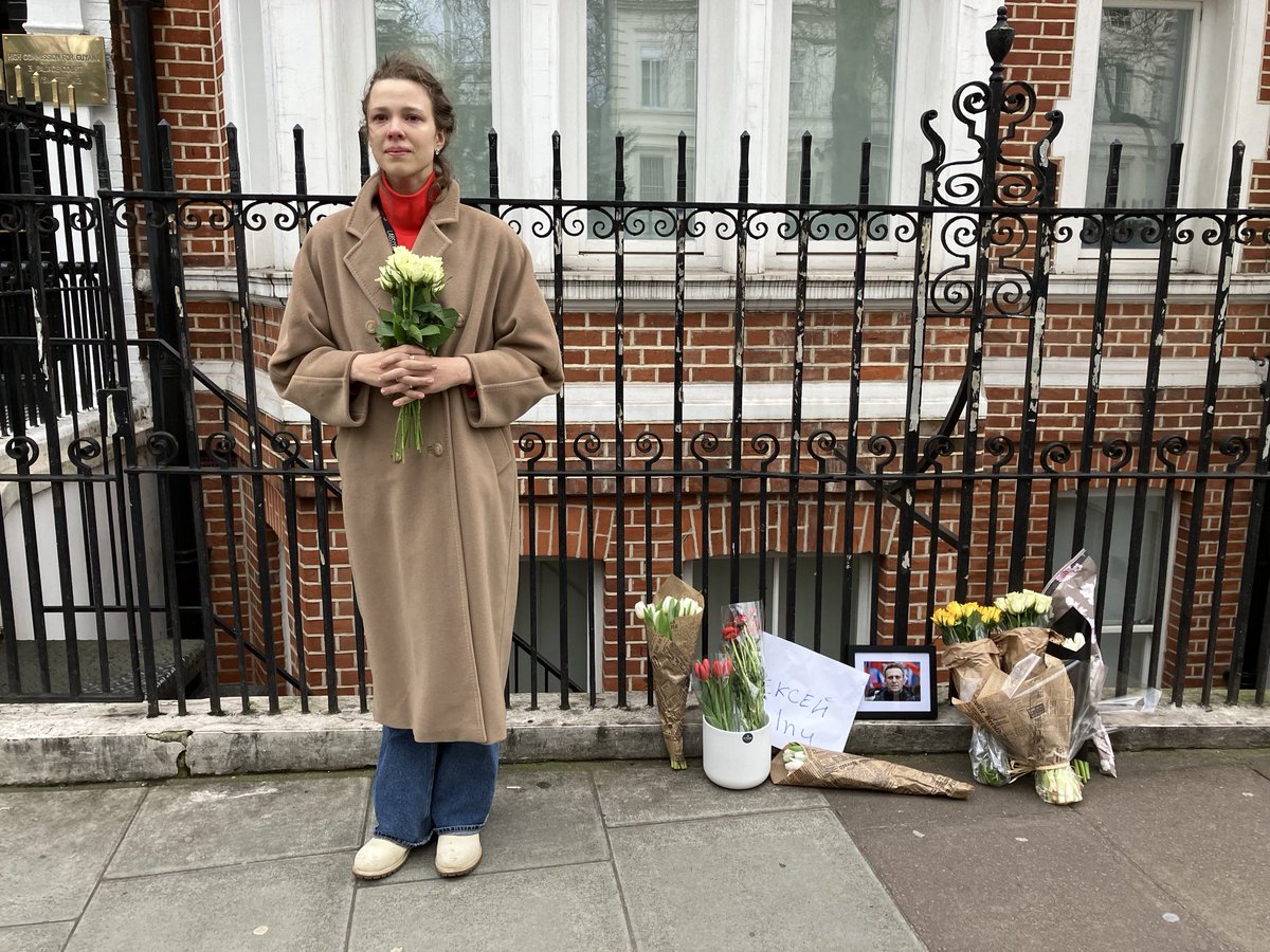 HenryCPorter's tweet photo. A  lone woman stands in vigil outside the Russian Embassy to mark Alexei Navalny’s murder by Putin’s regime. You can join her - and now me - to honour a great man and a Russian hero. https://t.co/QDAG2rVZ5v