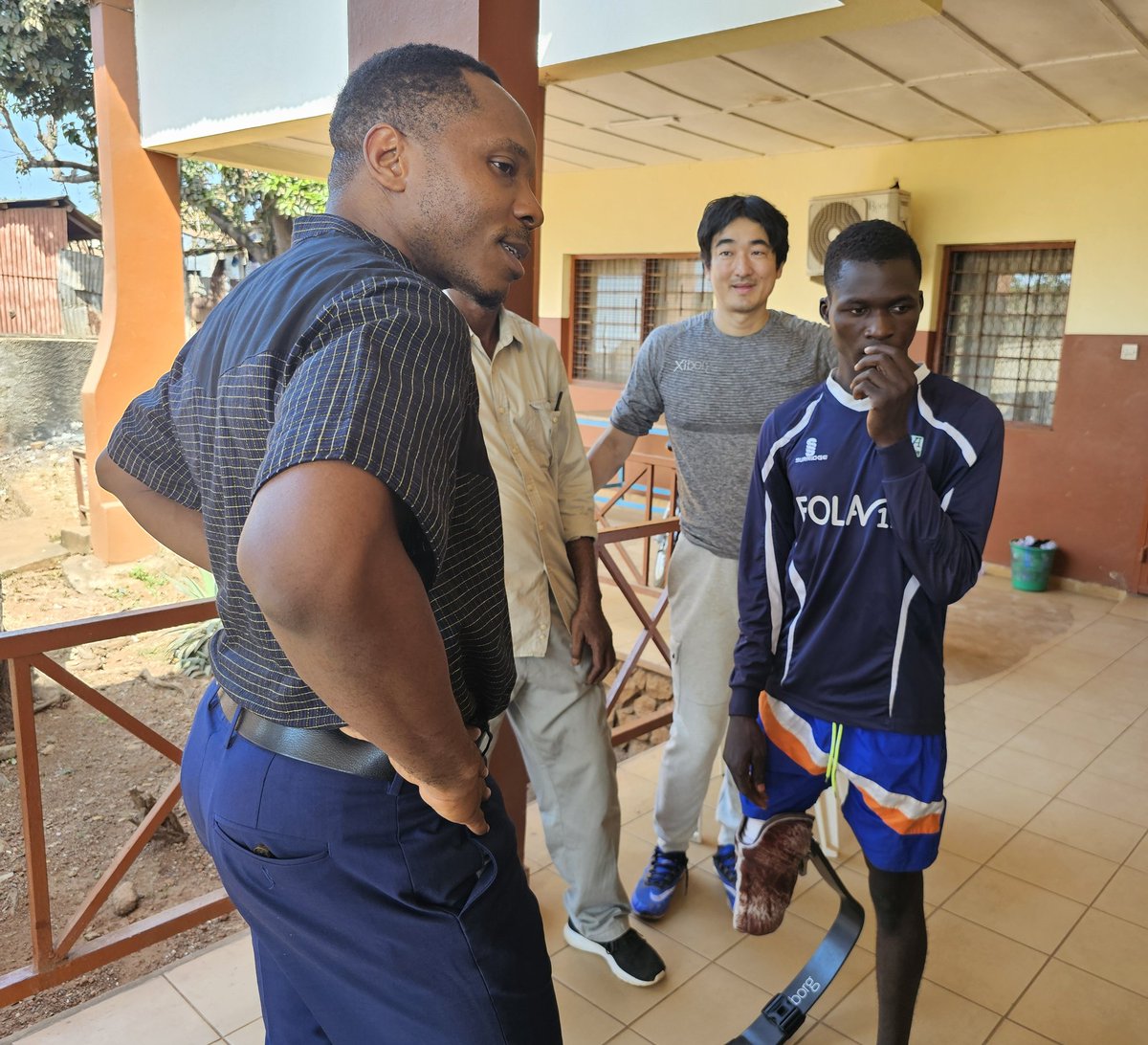dsengeh's tweet photo. Today, we saw the first prosthetic running blade fit on a patient (an athlete) in Sierra Leone at the National Rehabilitation Center. @kenendo and I studied with @hughherr at @medialab and taught a class called developing world prosthetics which Claudine (in yellow) took. Dreams! https://t.co/FMZceKz9ej