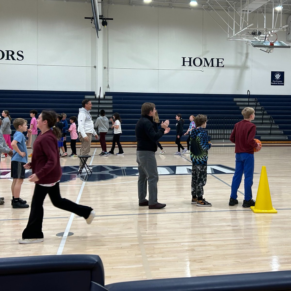 WestchesterCDS's tweet photo. In a pre-K-12 school, you never know who might stop by to cheer you on or join in. Music and theater teacher Ken Mickey stopped by 5th grade PE and joined in the basketball drills! #DiscoverWCDS #WCDSCommunity #WCDSGrade5 https://t.co/7sNQhA4YVo