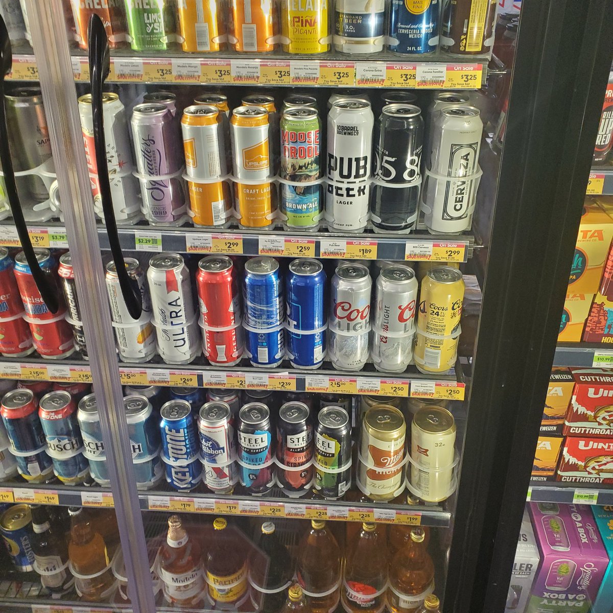 samclarke7's tweet photo. Can someone explain how a bottle of water costs $2.79 while beer is on the shelf, laughing with a cheaper tag? It's like the grocery stores and Coke joined forces to redefine 'thirsty for profit.' Inflation or price gouging? #RipOffAlert #inflation https://t.co/4n02yJbH05