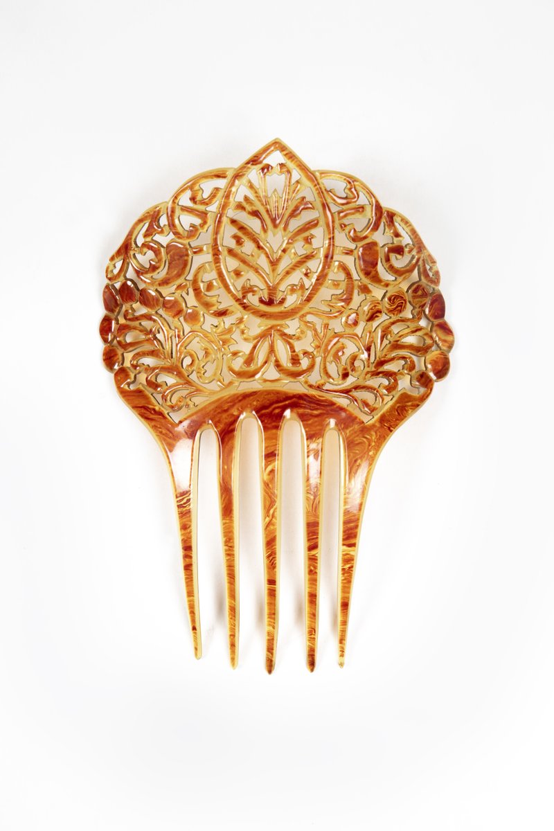 Friday Treat Time and a stunning selection of hair combs! Pretty and practical, these fashionable accessories were an essential part of a woman’s wardrobe in the 19th and early 20th centuries, when no stylish coiffure would be complete without an eye-catching ornamental comb.