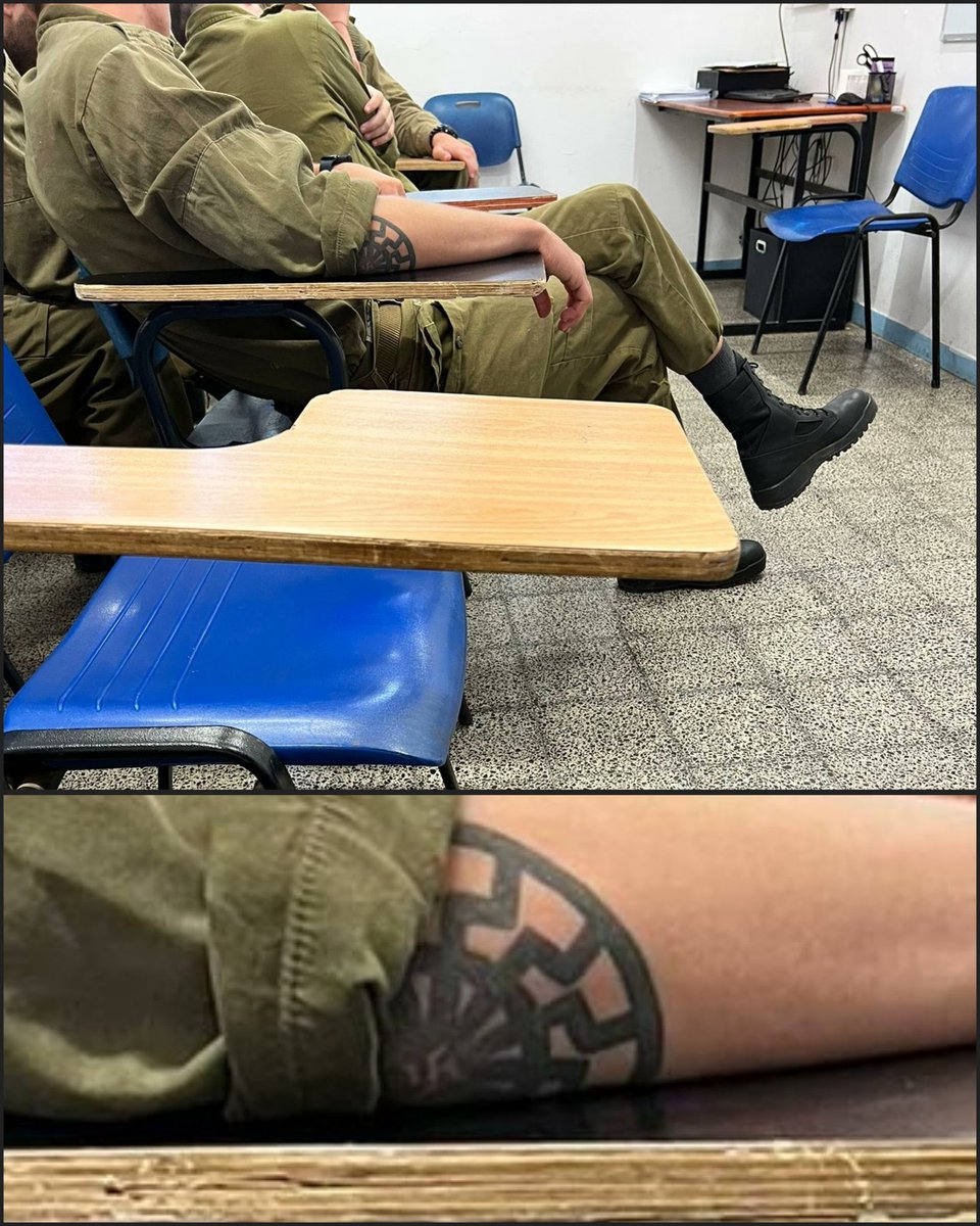 WarMonltor's tweet photo. most normal zionist terrorist 

(black sun is a nazi symbol) https://t.co/KAI04MHF5B