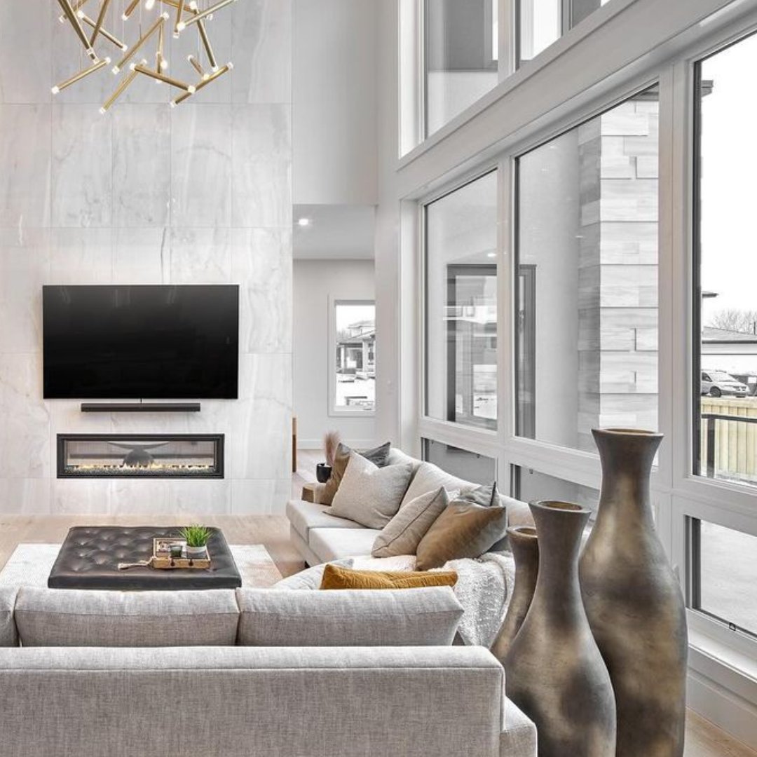 It's all about the details. From warm accents to plush textures, every element matters to create the ultimate living room retreat. And these windows? They're the perfect backdrop for bringing in natural light and warmth. #windowsanddoors #interiordesign #architecture #modernhomes