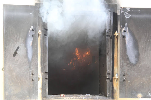 On Day 2, Students covered basement fire. This practice involves 2 people feeding the hose into the burn building while the others were inside extinguishing the fire. This is a glimpse of what you could see from the window as the fire began to build.
