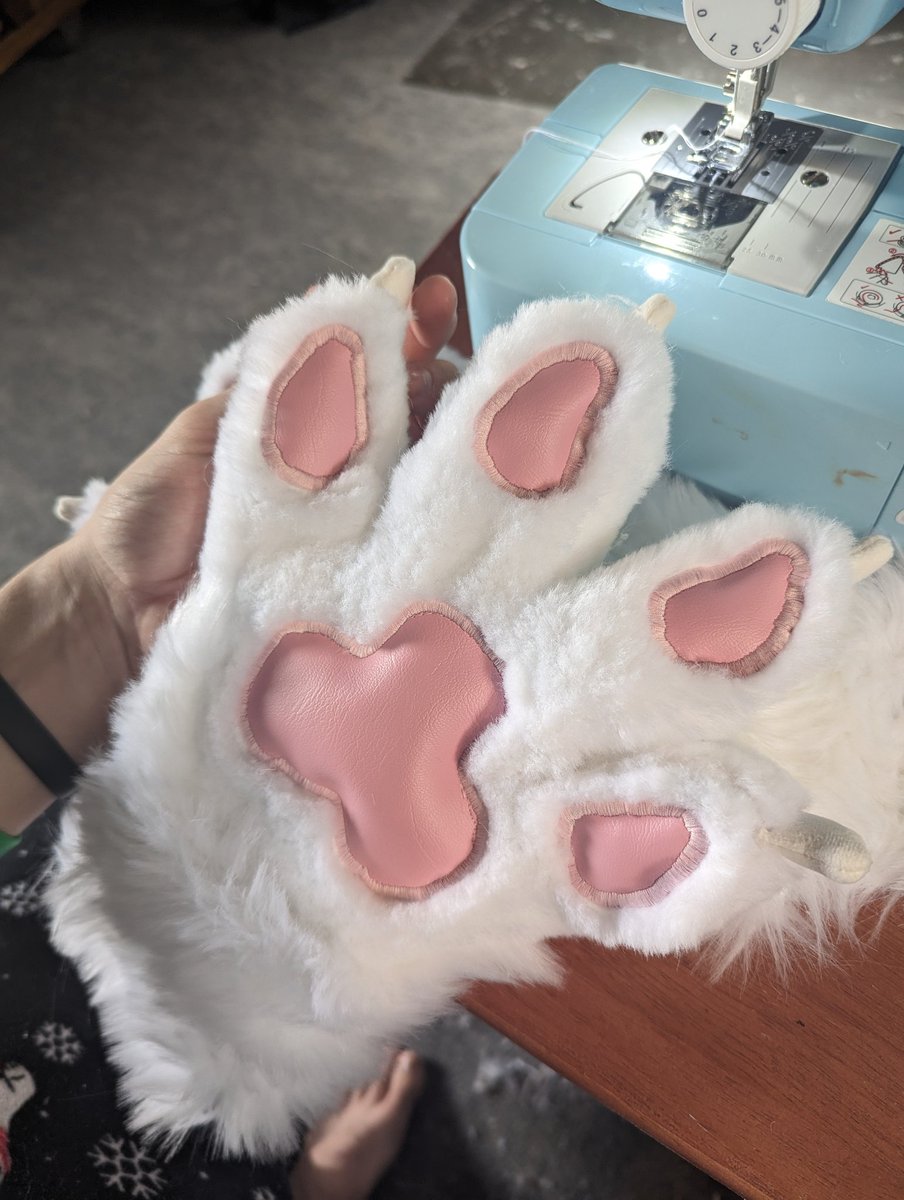 coffeepupsuits's tweet photo. Some white puppy paws I'm almost done with, getting the paw pads lined up is definitely a bit of a struggle but I think I am pretty happy with them https://t.co/LFRuirEtLO