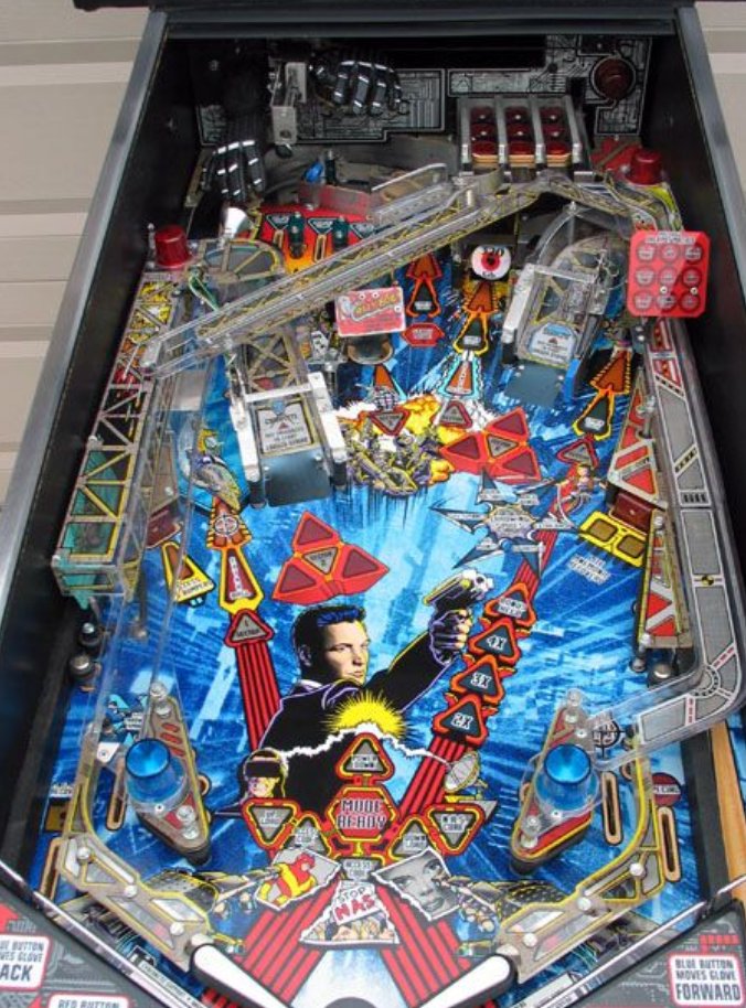 spacetwinks's tweet photo. look at this motherfucker! the cyberglove grabs the ball! let george gomez design a system shock pinball! https://t.co/ocnzFPbVzY