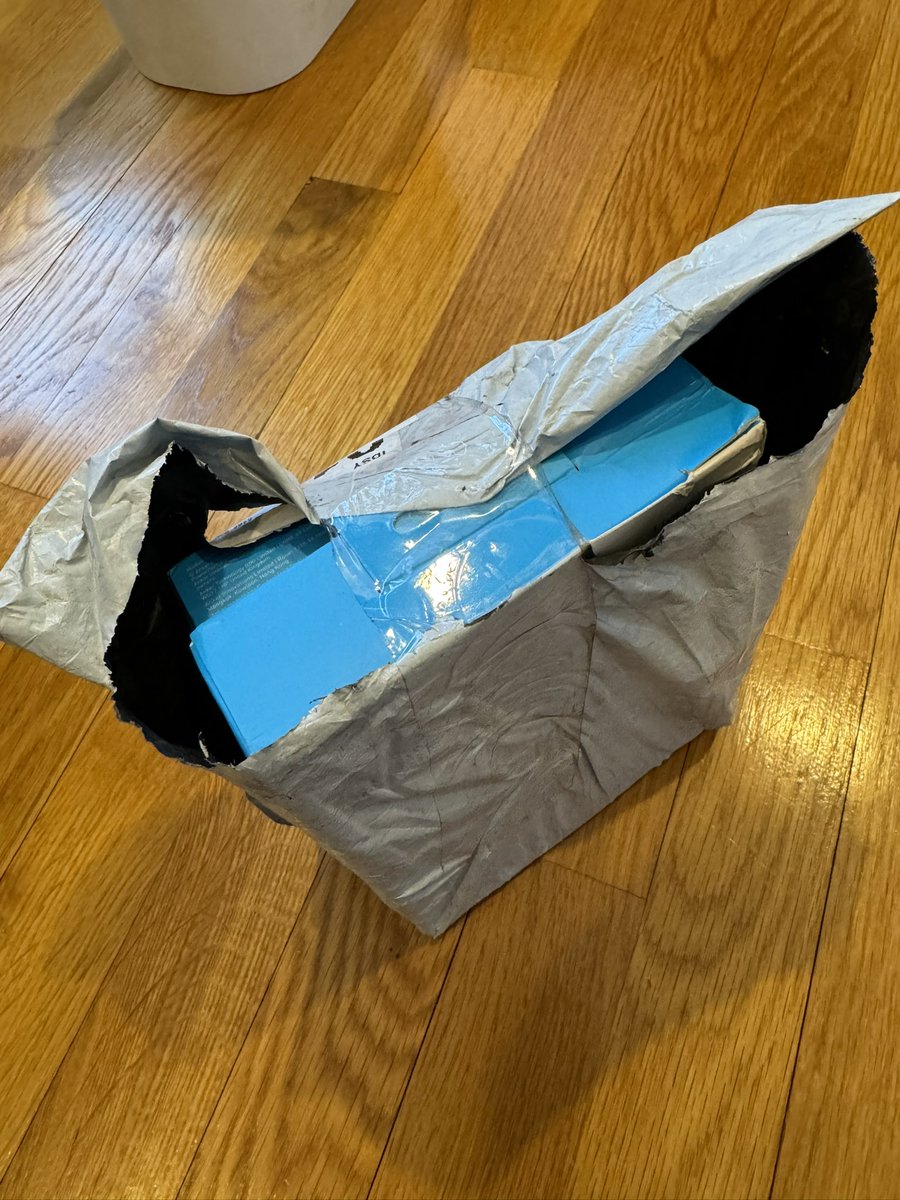 kevingrant5's tweet photo. @AnkerOfficial was excited to order your new lineup of MagGo products direct from your website. This is how the package looked when it showed up at my door. For the price of your tech, I think you should use boxes. This delivery feels cheap, and increases likelihood of theft. https://t.co/H41EhPxvsM