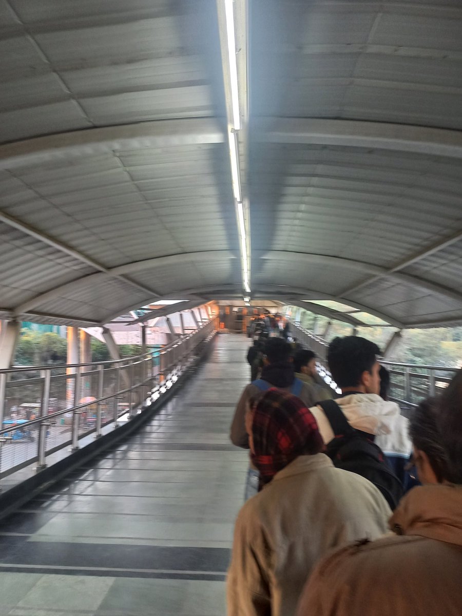 anand_501's tweet photo. @OfficialDMRC @RapidMetro 

Who decides the function of only one security gate, even at peak time. Been like this for more than a week! https://t.co/lKIxbtbN7S