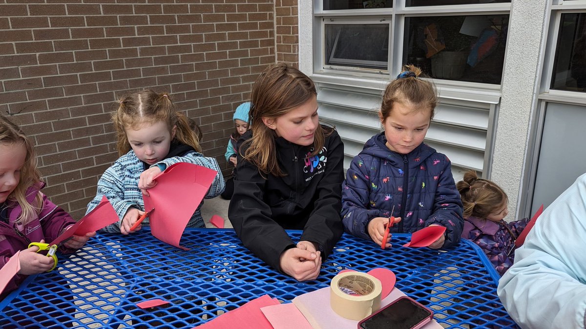 Last Friday we helped our Kindergarten Buddies cut out paper hearts and played outside, all during Crazy Hair Day.