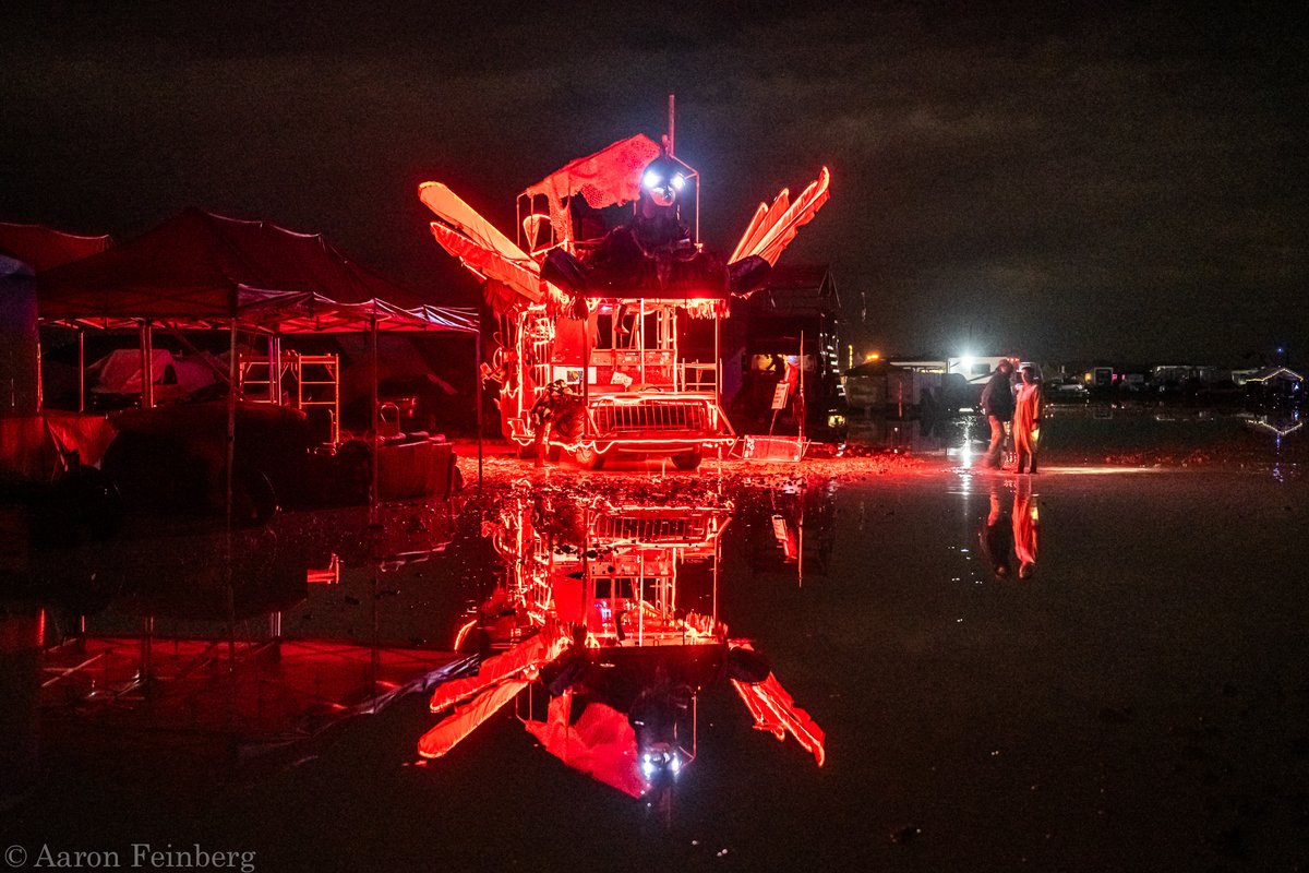 afeinphoto's tweet photo. Art car reflected in flooded streets! Surreal scene after the monsoon on Friday! FULL 2023 Burn album is now LIVE! https://t.co/9QhJselQTd!

Aloha!
aF
#burningman #playa #blackrockcity #brc #industwetrust #burningman2023 #playaportraits #thankslarry #afeinphoto #fuckyourmud https://t.co/wD9v2qiF6X