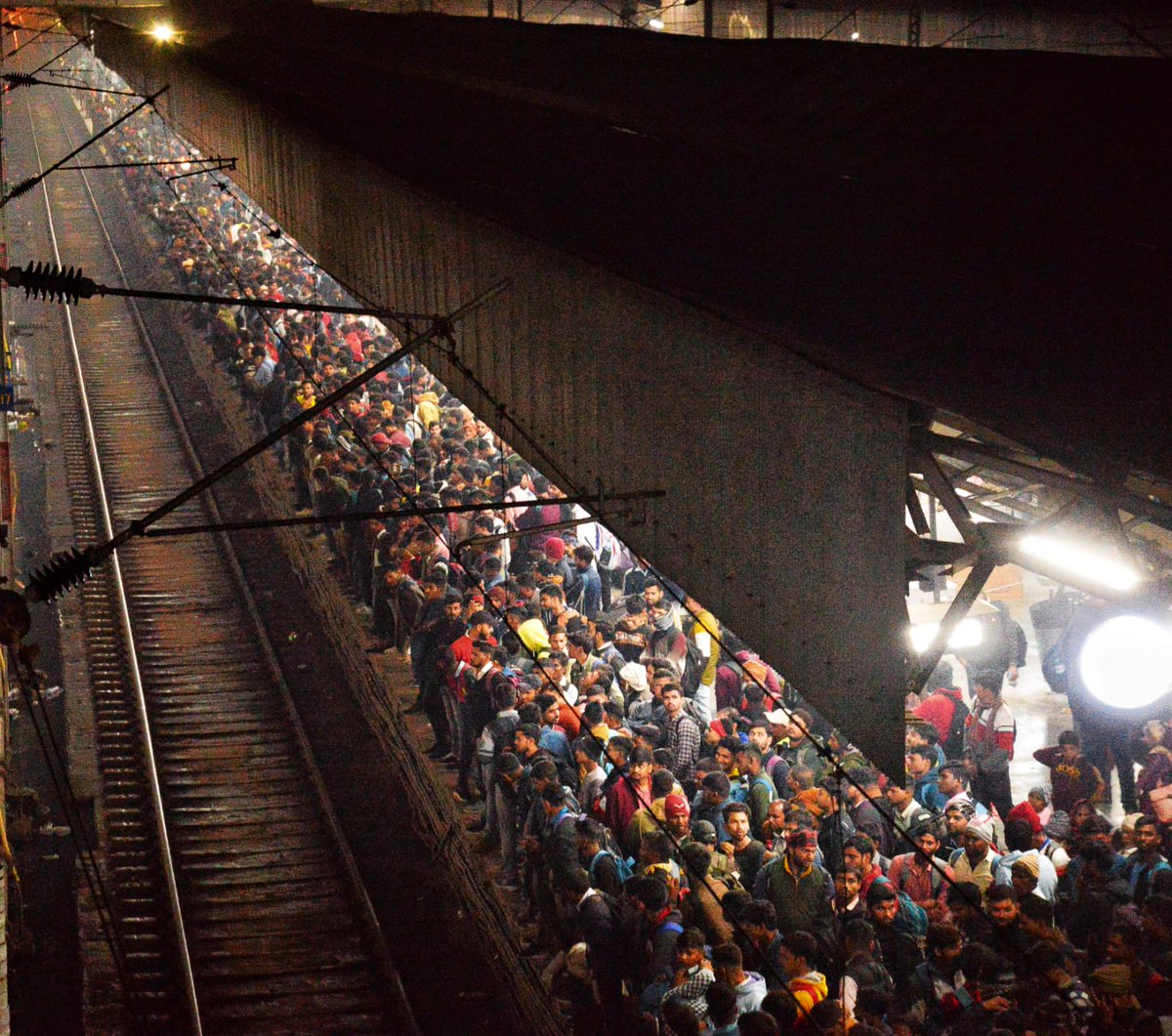 At 2 am, Kanpur Central Station is packed with job seekers, each inch is filled with hopefuls. With over five million youths vying for just 60k positions in the UP police, it showcases the challenging job market scenario. nn