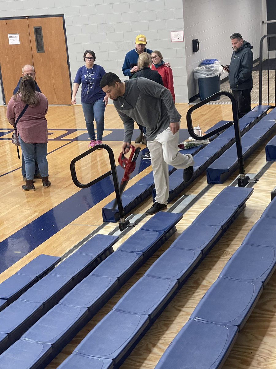 bhallier's tweet photo. Zach Goodrich, coach of the 1AD2 top-ranked Elyria Christian boys, doesn’t stop working. He’s in the seats, cleaning up after a long day of work and coaching. 

Zach is one of the best dudes in the business. Coaching and admin. @sportsinkansas @kpreps @joannachadwick @JoelMuhs_ https://t.co/50R9HnhNsC